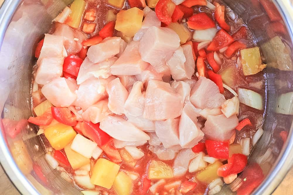 Healthy Sweet and Sour Chicken Ingredients in the Instant Pot ready to cook. 