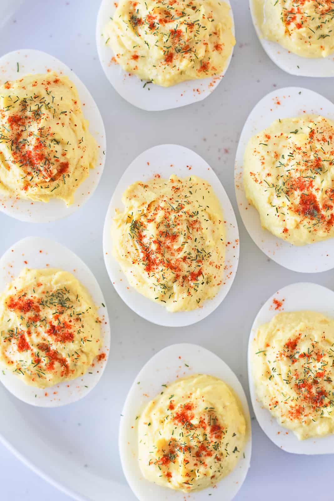 Keto Deviled Eggs sprinkled with dried dill and smoked paprika.