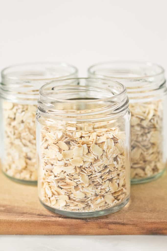 Three jars of old fashioned rolled oats.