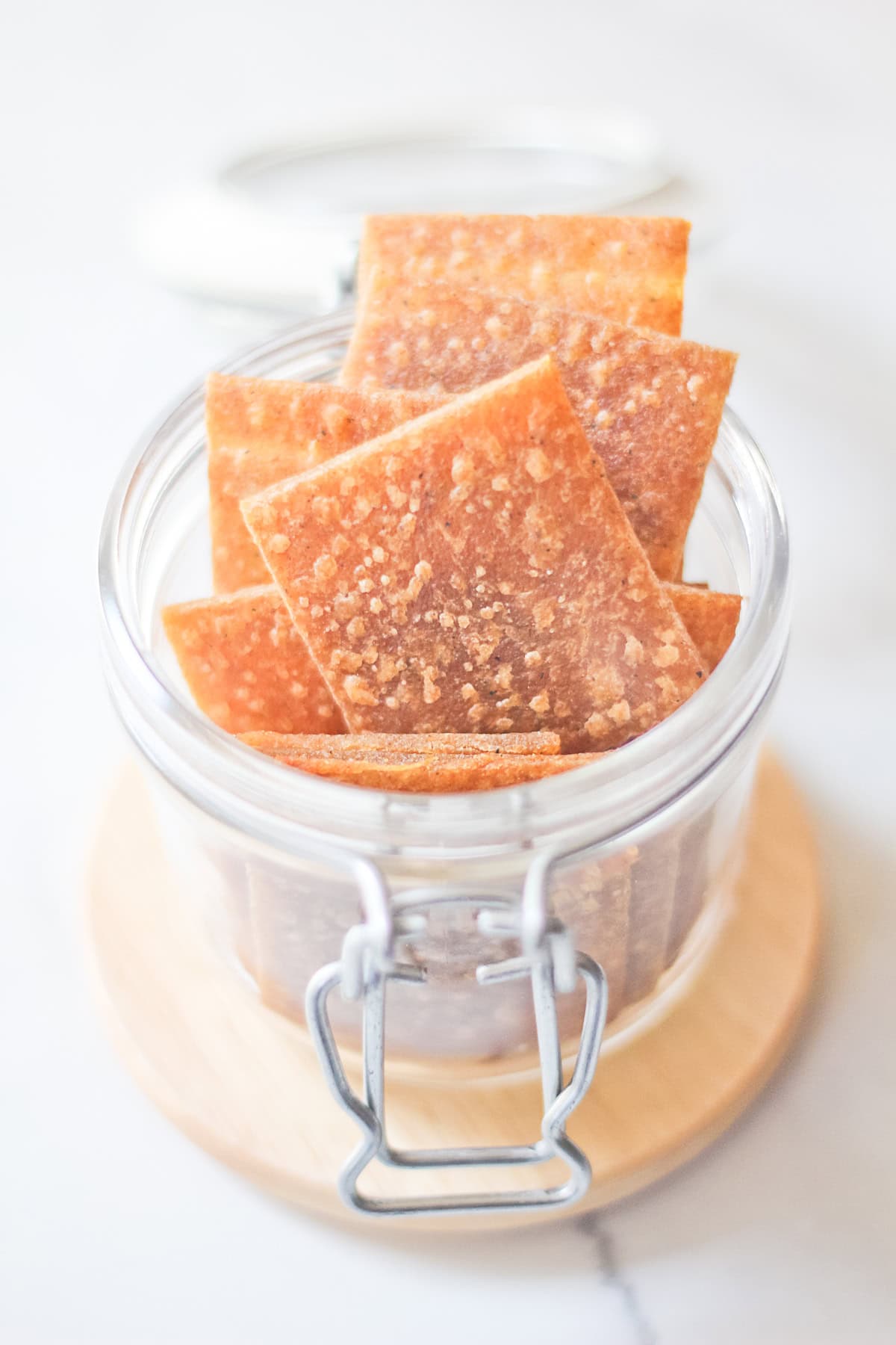 Einkorn Sourdough Discard Crackers in a jar.