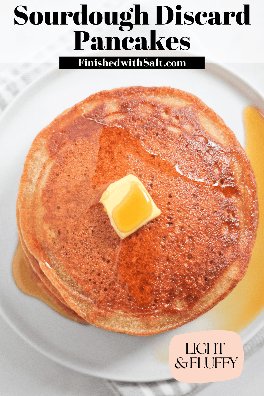 Pinterest photo with recipe title for sourdough discard pancakes and picture of pancake with butter and syrup.