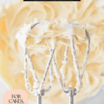 Pinterest pin image of cream cheese frosting on beaters.